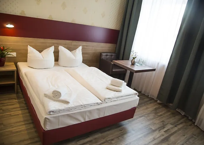 Отель Alexander Business